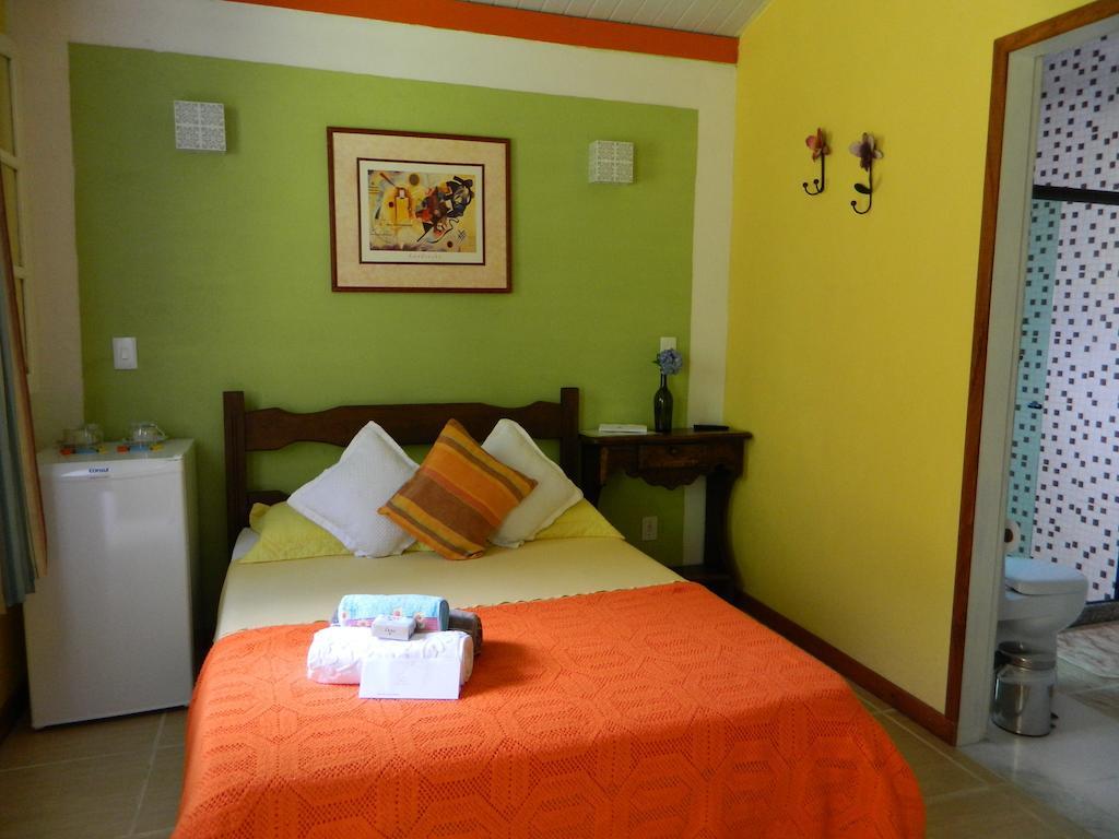 Bicho Do Mato Suites Гуапимирин Номер фото