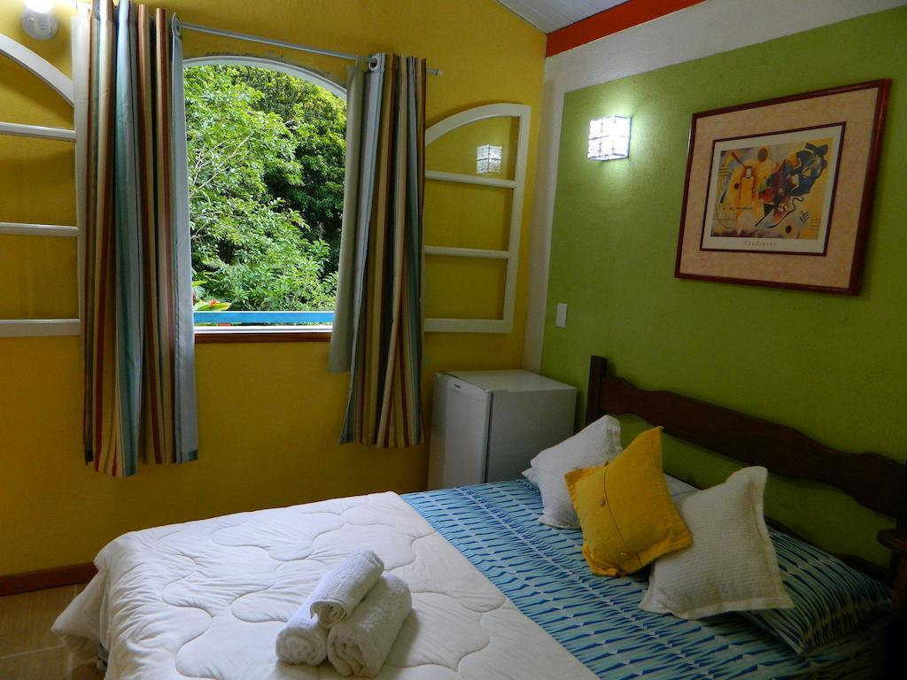 Bicho Do Mato Suites Гуапимирин Номер фото